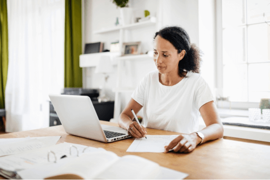 Woman using laptop in learning environment